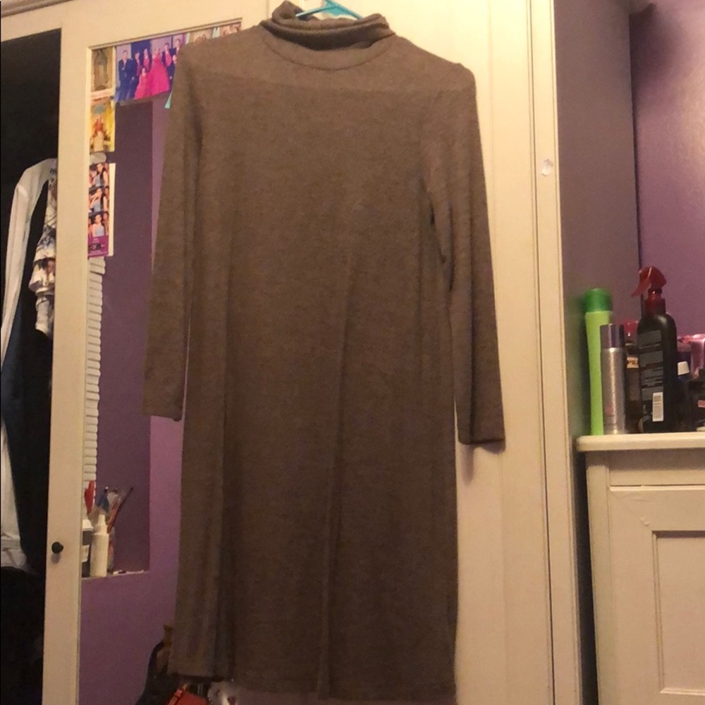 Light brown turtleneck sweater dress.